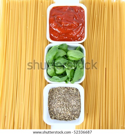 Ingredients: tomato sauce, basil leaves, spice and raw spaghetti