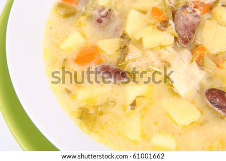 Pickled cucumber soup with some giblets (chicken hearts), traditional Polish cuisine