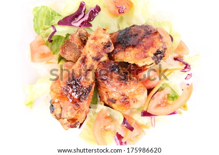 Fried chicken legs with side salad