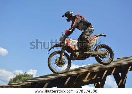SIBIU, ROMANIA - JULY 16: David Cyprian competing in Red Bull ROMANIACS Hard Enduro Rally with a KTM 250 EXC 2015 motorcycle. The hardest enduro rally in the world. July 16, 2015 in Sibiu, Romania.
