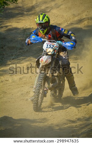 SIBIU, ROMANIA - JULY 18: Tony Parker competing in Red Bull ROMANIACS Hard Enduro Rally with a Kent Road Motorcycle motorcycle. The hardest enduro rally in the world. July 18, 2015 in Sibiu, Romania.