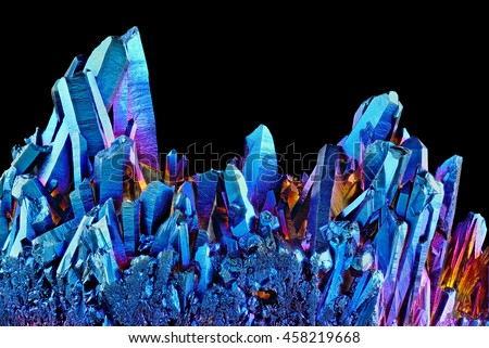 Quartz Rainbow Titanium aura crystal cluster on black background