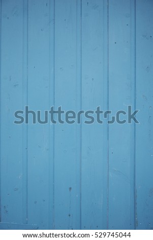 A full page of blue painted floor boards background texture