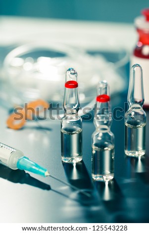 medical ampoule and syringe. Vials of medications.