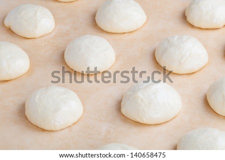 Small balls of fresh homemade pizza dough