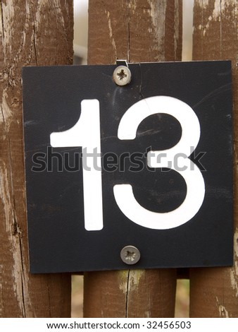 fence with the number 13