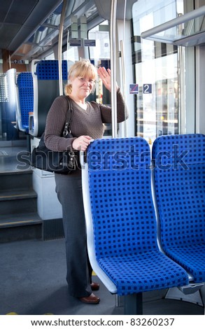 elderly woman on the train