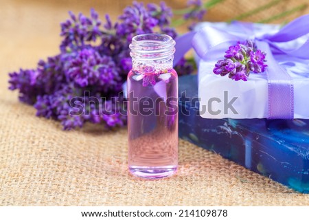 Natural handmade lavender Liquid soap and solid soap with fresh lavender flowers, on sackcloth
