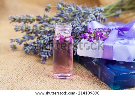 Natural handmade lavender Liquid soap and solid soap with fresh lavender flowers, on sackcloth