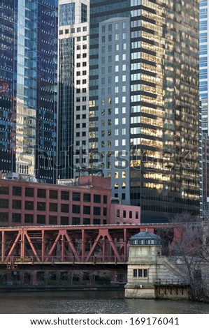 The Chicago River flows beneath the Lake Street bridge in the heart of downtown Chicago.