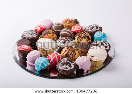 Different types of cakes in different shapes and colors