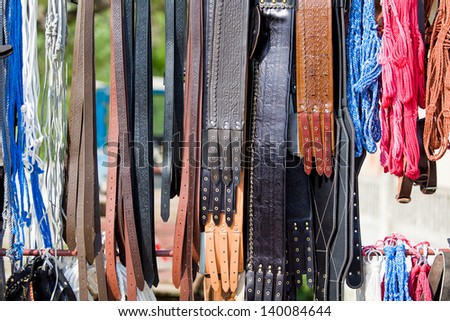 All types of vintage belts, slings, lanyards, girdle, leash isolated on a green background