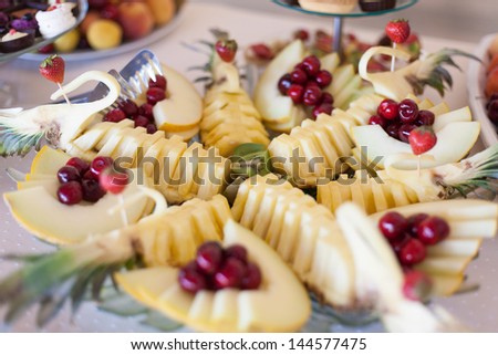 Different types of fruit all together on a plate