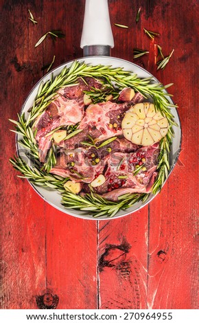 raw lamb loin chops meat in white pan, top view , close up
