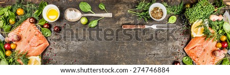 Raw salmon fillet with cooking ingredients: oil, fresh seasoning, spoon and fork on rustic wooden background, top view, banner for website.
