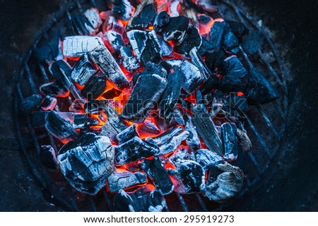 Burning coals, close up, background, top view
