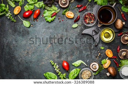 Fresh delicious ingredients for healthy cooking or salad making on rustic background, top view, banner. Diet or vegetarian food concept.