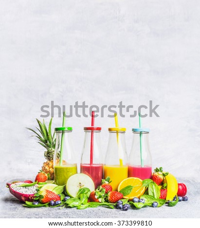 Smoothies  assortment  with fresh ingredients for mixing  on light wooden background, side view. Superfoods and health or detox  diet food concept.