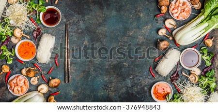 Asian food background with various of cooking ingredients on rustic background , top view , banner.  Asian food concept: Chinese or Thai cuisine.