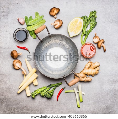 Blank Wok pan and ingredients for Chinese or Thai  cooking , top view. Asian cuisine