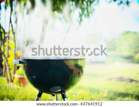 Grill with smoke over summer  outdoor nature in garden or park, outdoor, close up