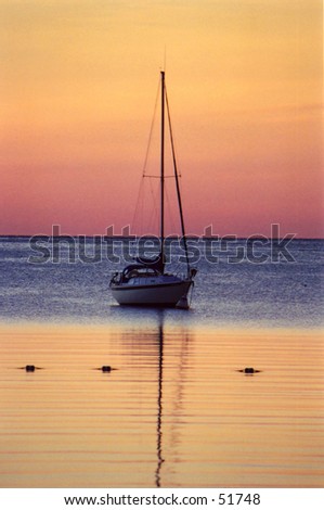Sail boat on Ephrem Bay during a sunset in Door County\
\
Wisconsin