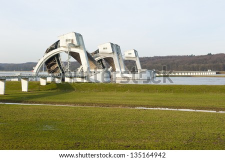 DRIEL, THE NETHERLANDS - JANUARY 10: Stuw Driel, the weir in the river Rhine (Nederrijn), with open bows allowing undisturbed passage to ships and boats on january 10, 2011 in Driel, the Netherlands.
