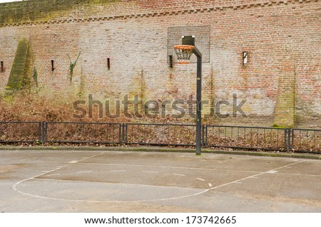 Basketball field near ancient city defense wall