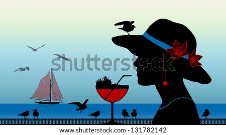 profile of a young woman drinking a strawberry cocktail with a seagull on her hat looking on the sunset above the sea
