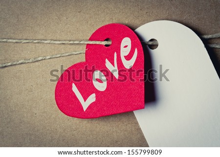 cardboard tag heart shaped red with love word
