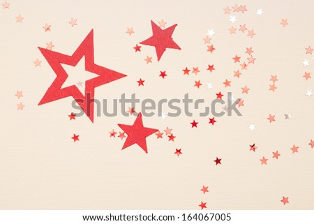 white background with big red star and little red and silver stars