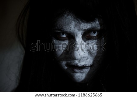 Close up face of horror woman ghost cruel, halloween day concept