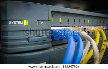 Ethernet RJ45 cables are connected to internet switch on business server network
