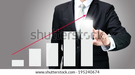 Businessman standing posture hand touch graph finance isolated on gray background