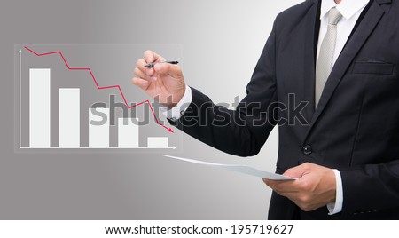 Businessman standing posture hand hold a pen isolated on gray background