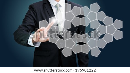 Businessman standing posture hand touching technology concept on dark background