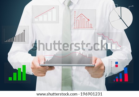 Businessman standing posture hand graph on tablet isolated on dark background