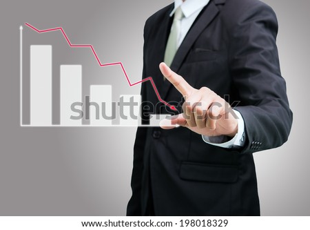 Businessman standing posture hand touch graph finance isolated on over gray background