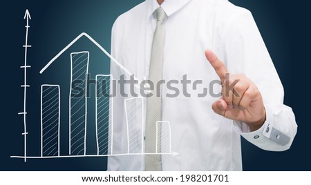 Businessman standing posture hand touch graph finance isolated on dark background