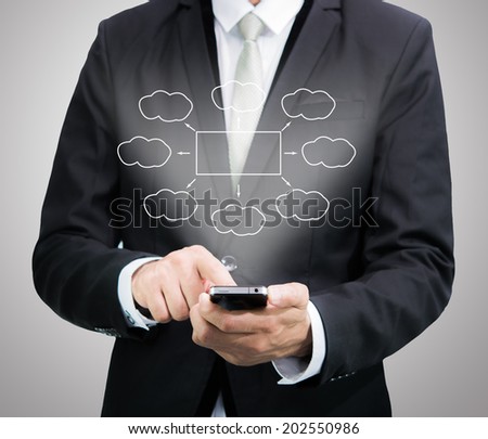 Businessman standing posture hand hold mobile phone isolated on blue background