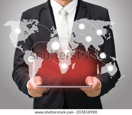 Businessman standing posture hand hold globe map on tablet isolated on gray background
