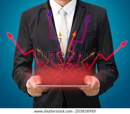 Businessman standing posture hand hold graph on tablet isolated on blue background