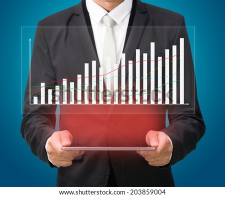 Businessman standing posture hand hold graph on tablet isolated on blue background