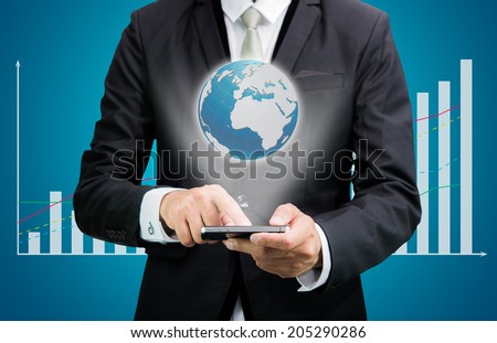 Businessman standing posture hand hold mobile phone analyze graph isolated on blue background
