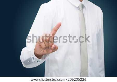 Businessman standing posture hand touch isolated on over dark background