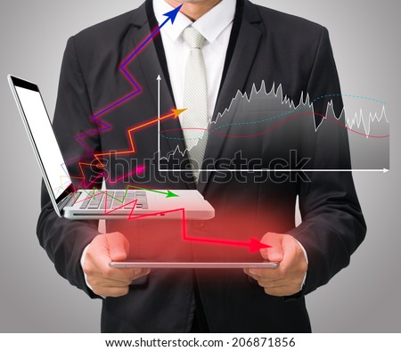 Businessman standing posture hand hold graph on tablet isolated on gray background