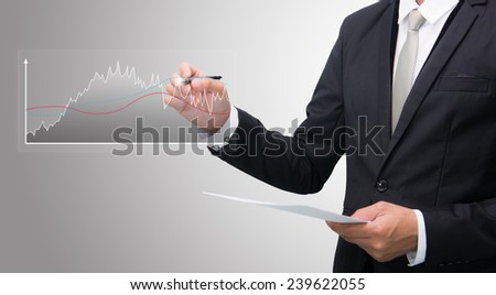 Businessman standing posture hand hold a pen isolated on gray background