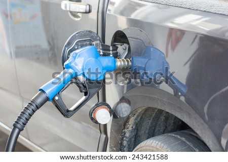 Refilling the car with fuel on a filling station