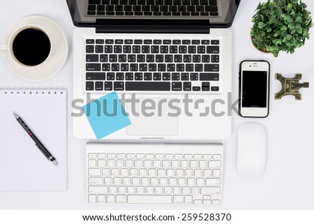 Top view laptop or notebook workspace office on white table