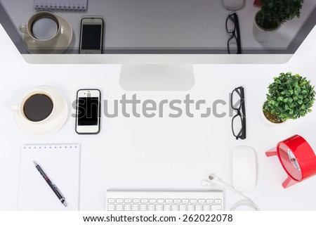 Business office top view computer monitor on white table